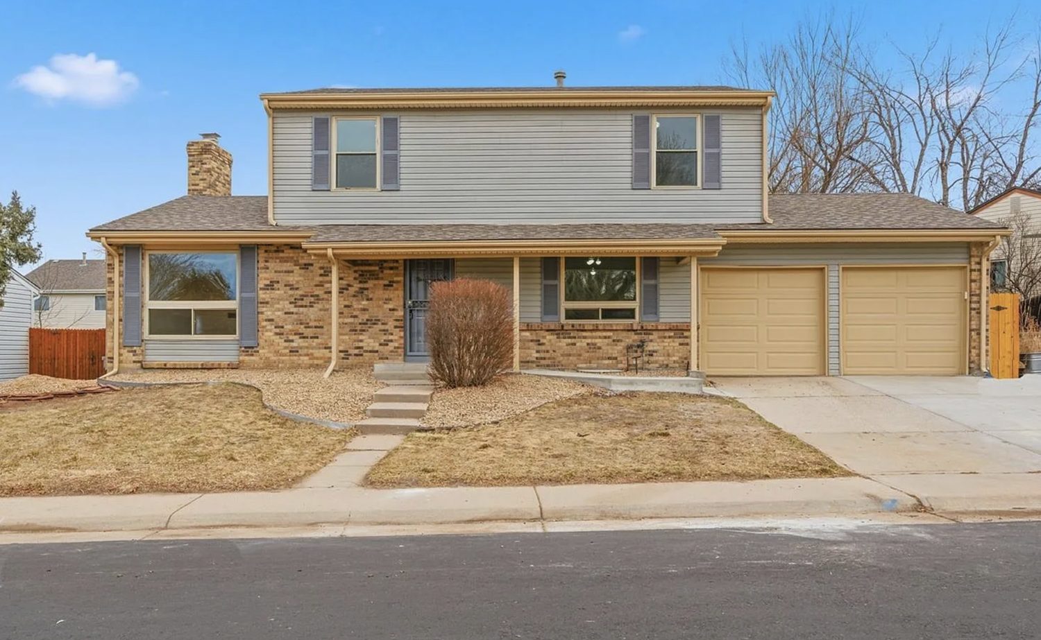 Two-story brick and siding home in Aurora 80015 as it stands today