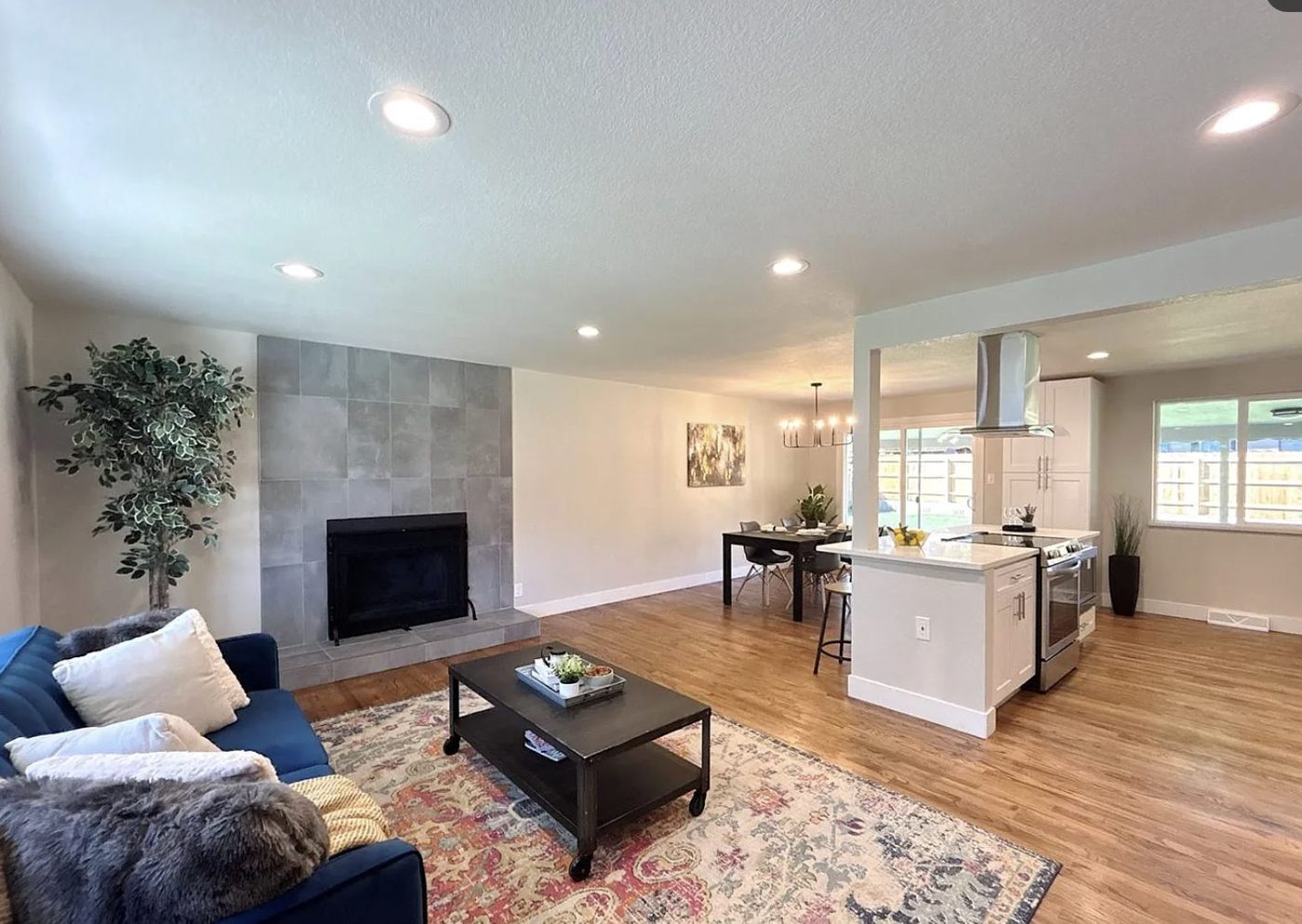 Renovated open living room with refinished fireplace, Lakewood 80232