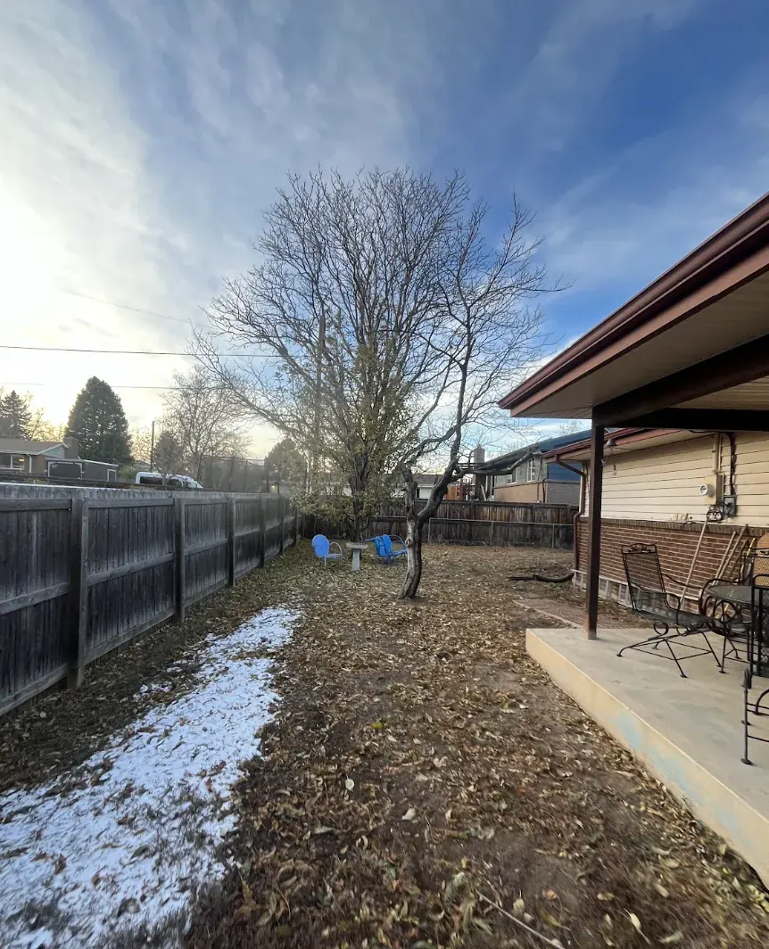 Backyard of a Littleton, Colorado house bought as-is by Windcrest Investments, before