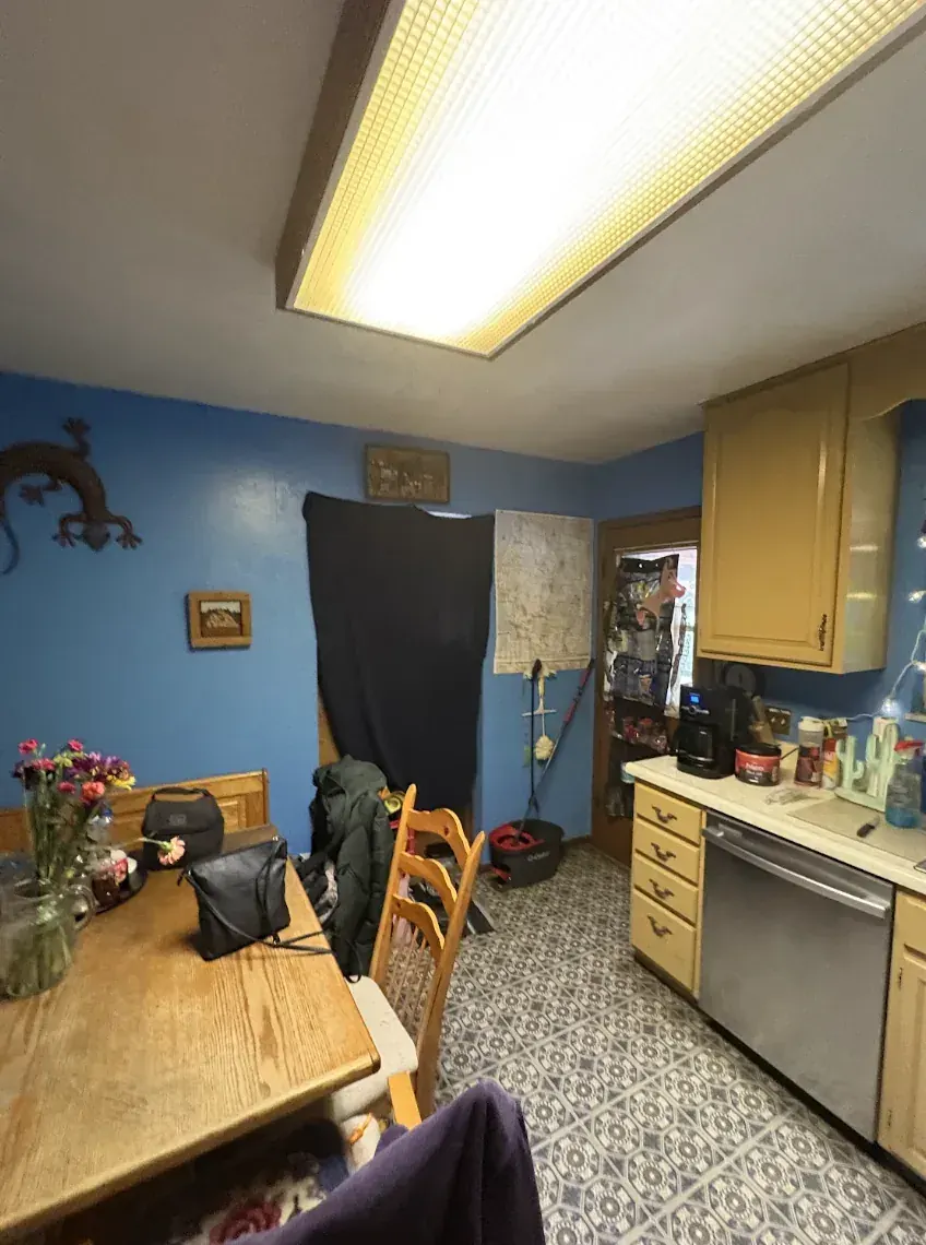 Kitchen of a Northglenn, Colorado house bought as-is by Windcrest Investments, before
