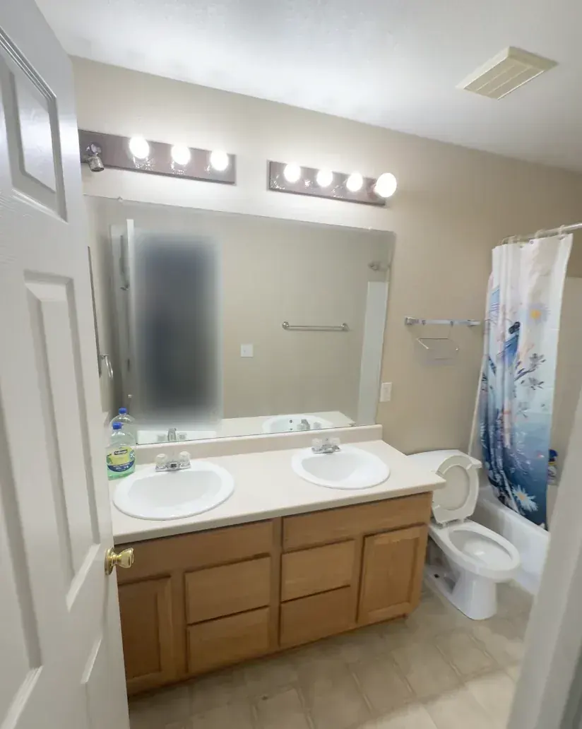 Bathroom of a Thornton, Colorado house bought as-is by Windcrest Investments, before