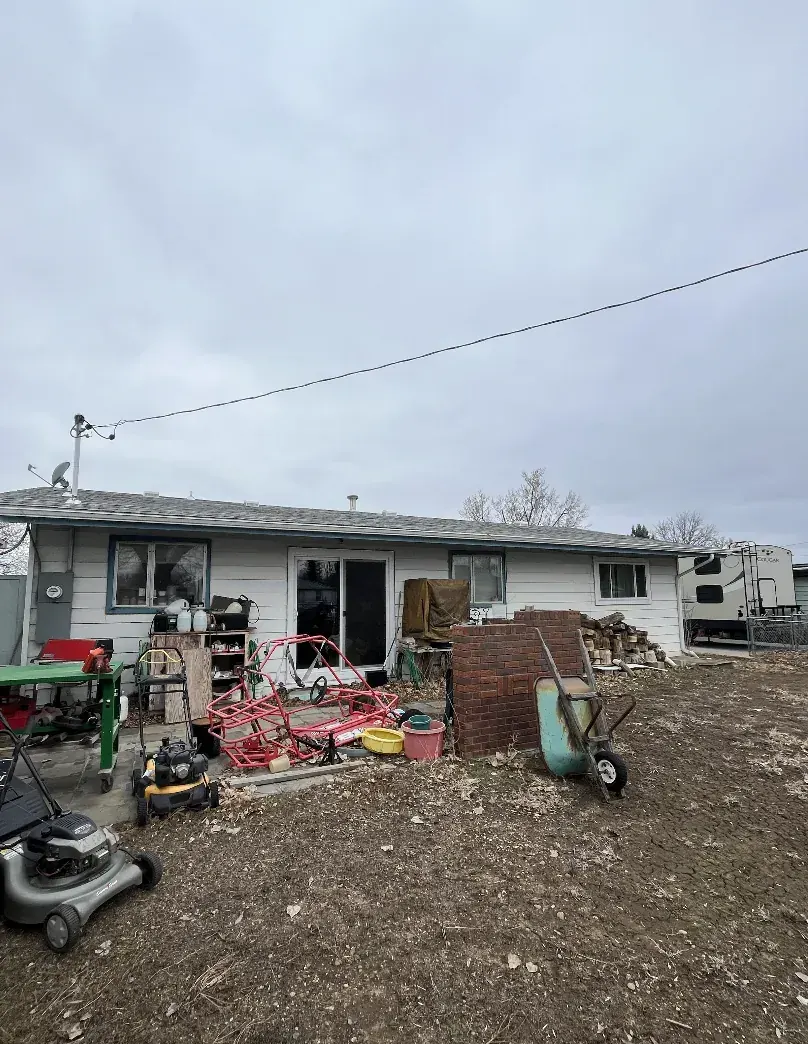Backyard of a Wheat Ridge, Colorado house bought as-is by Windcrest Investments, before